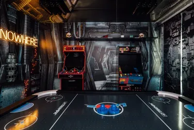 Fun game room with entertainment setup, perfect for kids and adults to relax, play, and hang out.