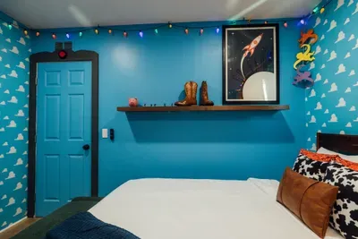 Fun and immersive Toy Story-themed bedroom with vibrant décor for a playful and memorable stay.