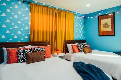 Whimsical Toy Story bedroom designed with colorful, character-inspired touches that bring the movie to life.