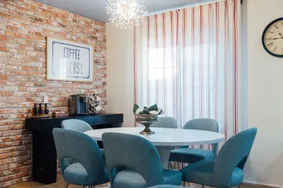 Comfortable dining room perfect for enjoying meals together with family and friends.