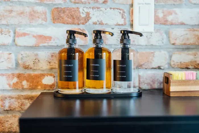 Enjoy a variety of flavored syrups to elevate your coffee experience.