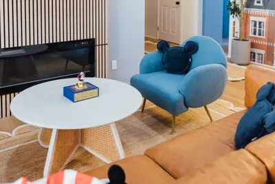 Bright and modern living room featuring comfortable seating and a fun, eye-catching design.