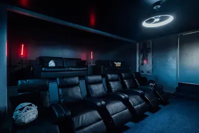 Dedicated movie theater space perfect for binge-watching, relaxing, and enjoying movie nights in comfort.
