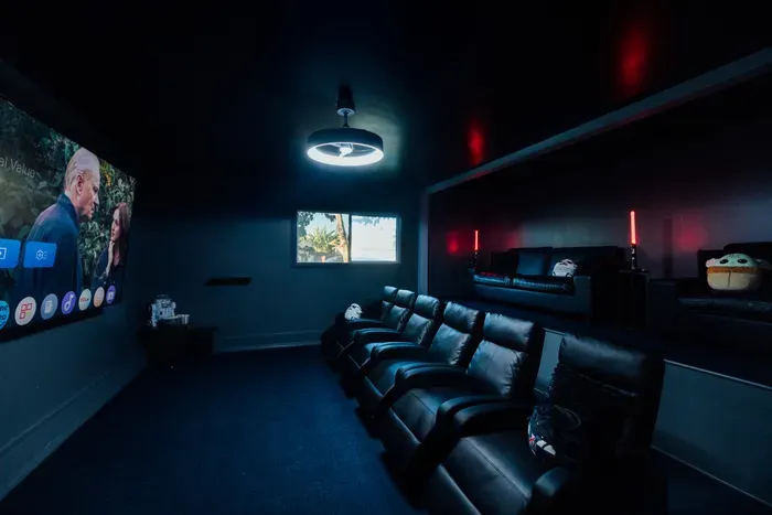 Private cinema-style movie theater offering an immersive entertainment experience with a cozy, relaxing atmosphere.
