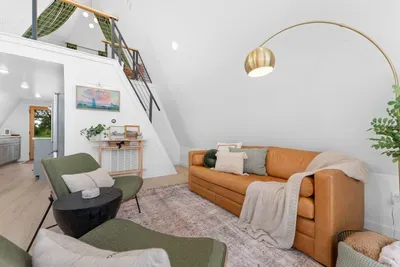 Living Room: Stylish space with warm textures, artistic decor, and a touch of modern charm!