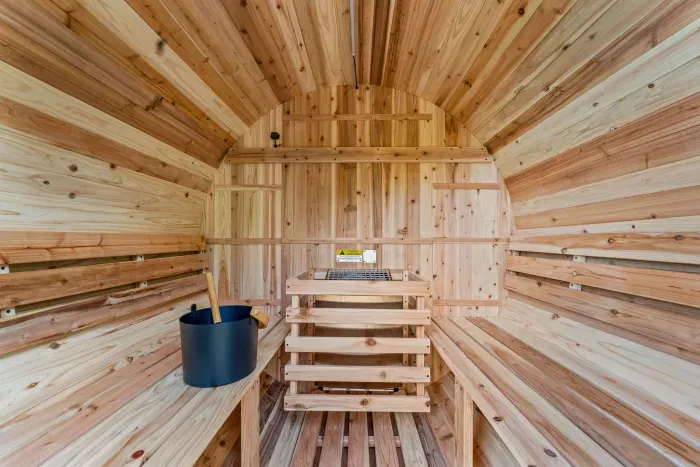 Step into the barrel sauna and let the steam melt your worries away. 🧖‍♀️🌿