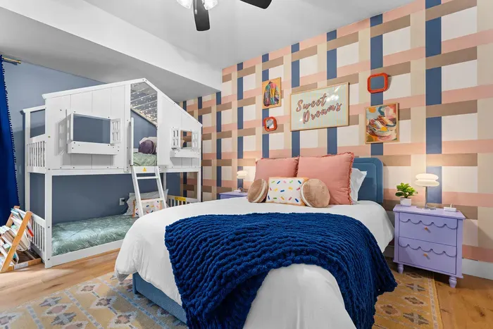 Queen bed + twin treehouse bunk = ultimate flexible family suite. 🛏️🏕️