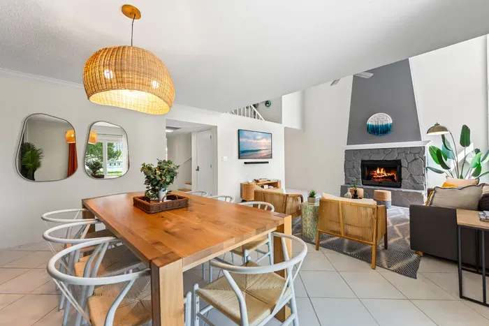 Welcome to Seabreeze Villa! This coastal-inspired entryway sets the tone with natural wood accents, soft lighting, and thoughtful decor—inviting you to unwind and feel right at home. ✨