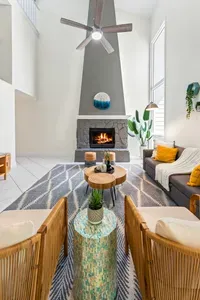 Stylish and comfortable living room made for easy, relaxed stays. ✨