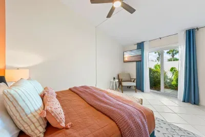 Beautifully styled bedroom offering a warm and restful atmosphere.