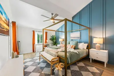 Relax and recharge at Seabreeze Villa, where a coastal-chic bedroom with calming hues and cozy textures sets the tone for the perfect beachside stay. ✨