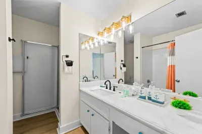 Situated perfectly between the bunk room and the main living areas, this bathroom offers seamless access for everyone.