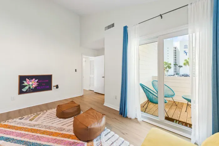 Bunk bedroom with direct balcony access.