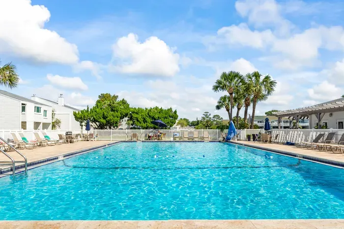 Dive into paradise at Seabreeze Villa! Unwind by the sparkling pool under swaying palms or take a 4-minute stroll to the beach.