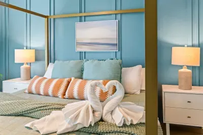 Escape to serenity at Seabreeze Villa! Unwind in this coastal chic bedroom, where soothing hues and cozy textures invite you to relax after sun-soaked adventures. Your beachside retreat awaits—reserve your stay today! ️✨