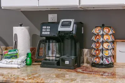 Savor your first sip at our dedicated coffee corner, fully stocked with a Keurig, premium brews, and all the essentials.