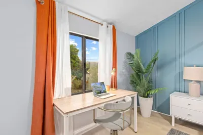 Need to catch up on work? Our dedicated workspace features a sleek desk and comfortable chair, perfectly positioned in front of a window to keep you inspired and productive. ✨