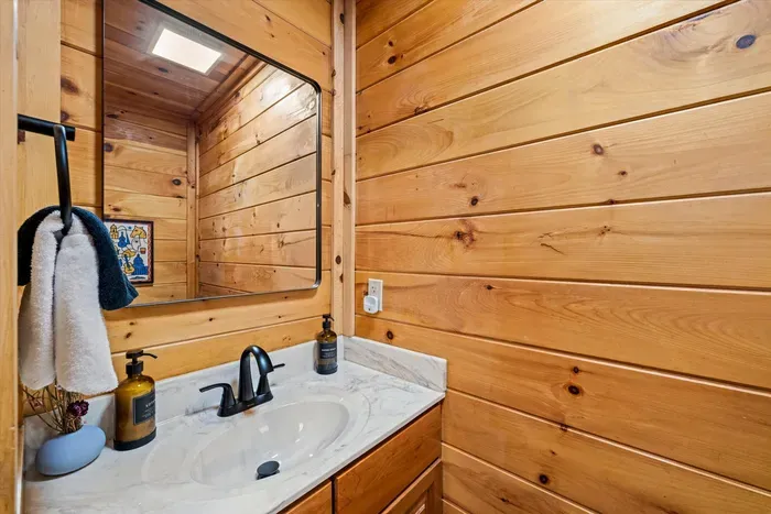 Half bath located just off of the kitchen