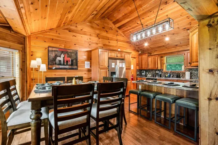 Dine together with seating for 12, including an island and dining table.