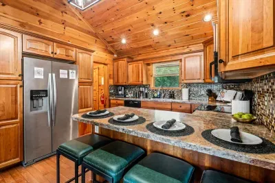 Easily sit 4 people at the island that is located right by the dining table for conversations.
