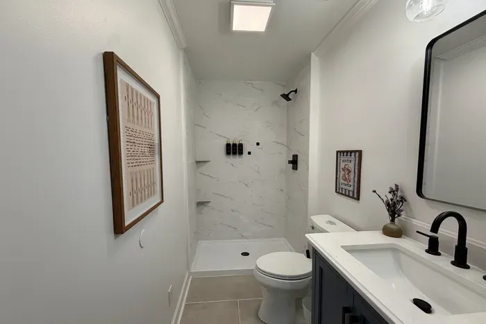 Ensuite bathroom with a newly renovated walk-in shower.