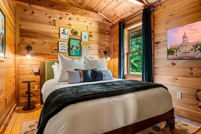 Comfortable second-floor queen room with a Roku TV.