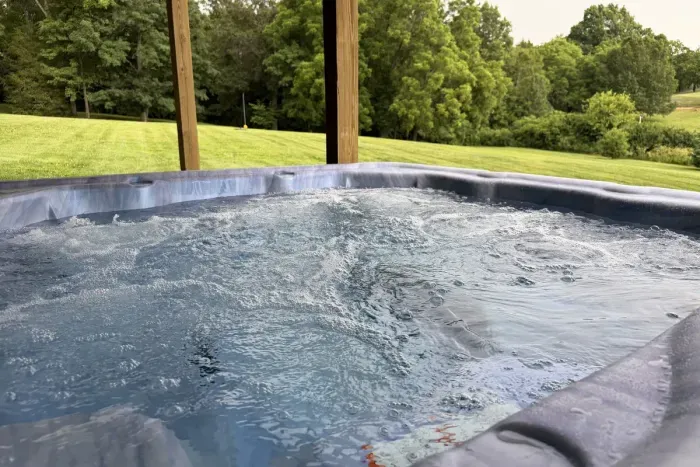 Relax in the new 7-person hot tub just outside the double king room.