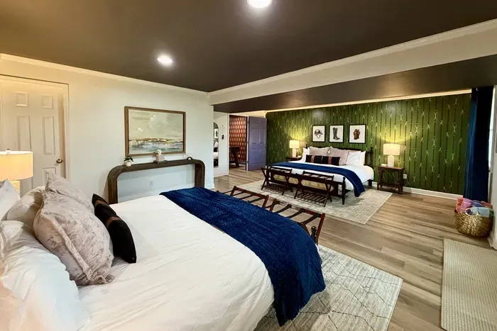 Perfect for groups—basement bedroom with two king beds.