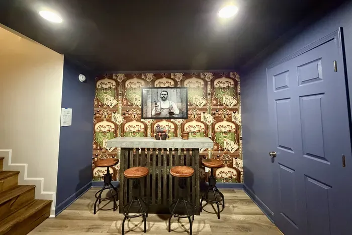 Enjoy drinks and conversation at the game room cocktail bar.