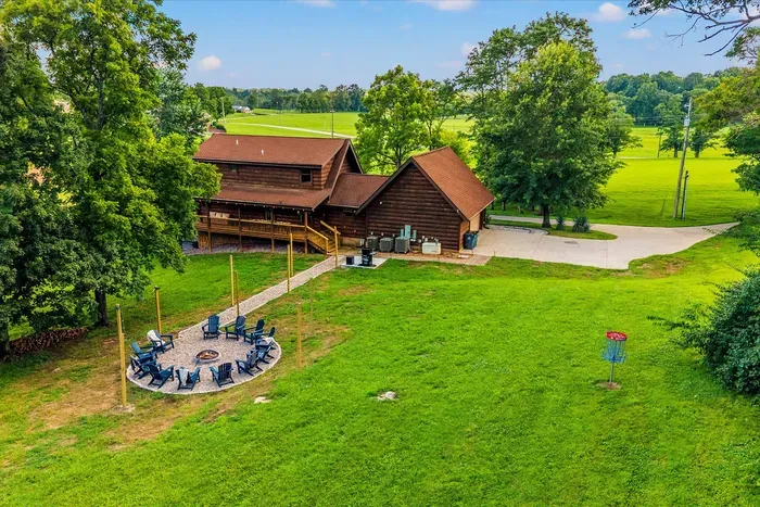 The perfect place to unwind while friends and family enjoy the backyard disc golf course.