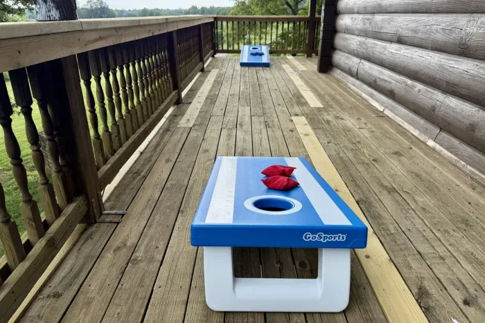 Enjoy a game of cornhole on the deck with all-weather boards.