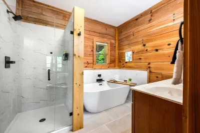 Newly renovated bathroom with a soaking tub and walk-in shower.