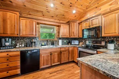 Cook with ease in the fully stocked kitchen and additional seating at the island.