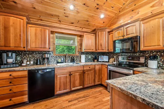 Cook with ease in the fully stocked kitchen and additional seating at the island.