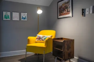 The sitting area in the king bedroom is perfect for reading a book about bourbon and horses