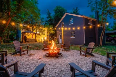 Sip bourbon by the fire under glowing string lights