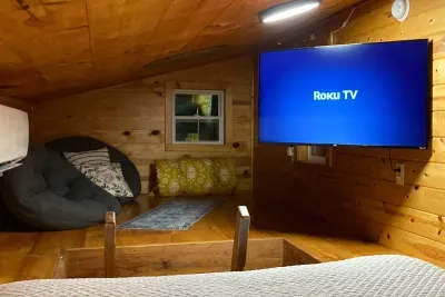 This Roku TV allows you to stream your favorites from your apps. Sign in when you arrive and it will automatically sign you out when you check out.  Free Starlink Wifi included.