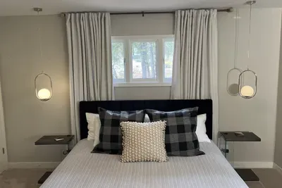 Two King en-suites with black-out curtains provide a restful night's sleep. Suite 1 has a Stearns & Foster King mattress with 100% cotton sheets and bedding.