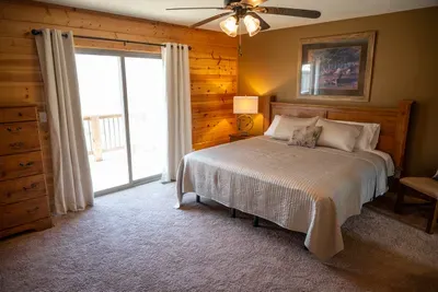 The "Sunset Suite" aptly named because right outside that sliding glass door is a beautiful sunset whispering goodnight to those within. Sneak outside with your sweetheart, a glass of wine and enjoy God's glory. He never disappoints!