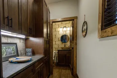 Pantry with view into the Powder Room