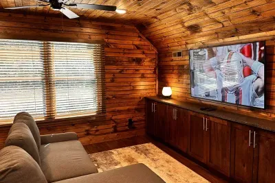 Upstairs game loft complete with a sleeper sofa