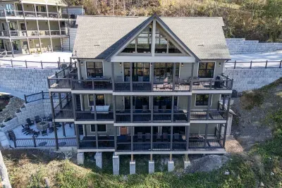 Amazing 3 levels of covered decks.  Rock and visit no matter the weather!