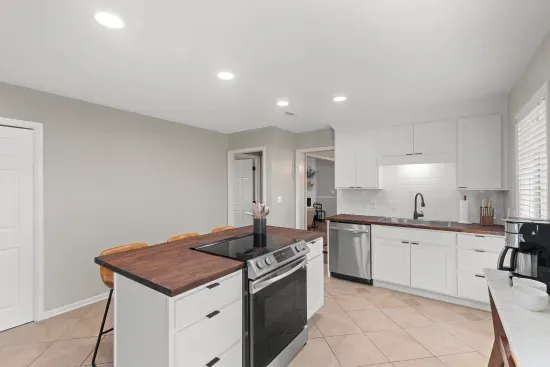 This kitchen is great for cooking or for hanging out with friends and family.