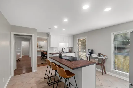 Enjoy the spacious kitchen. It makes preparing a meal easy.