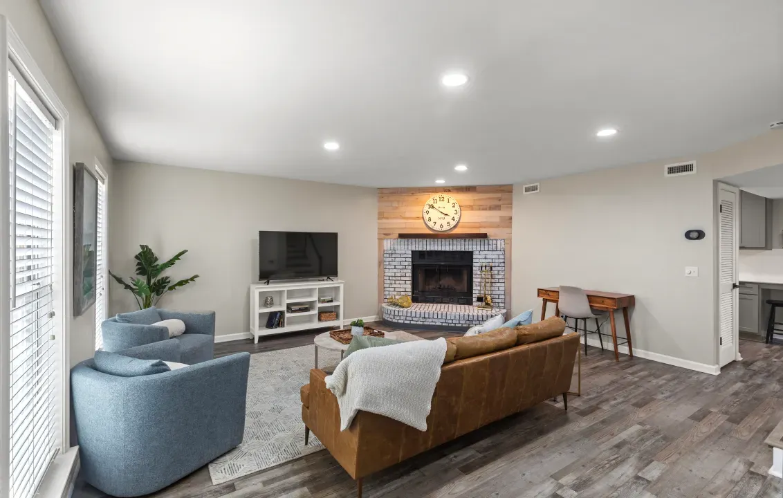 Spacious And Comfortable Living Area With 55" Smart TV and Fireplace