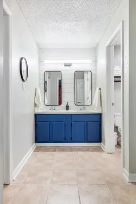 Each of the two bathrooms has double vanities