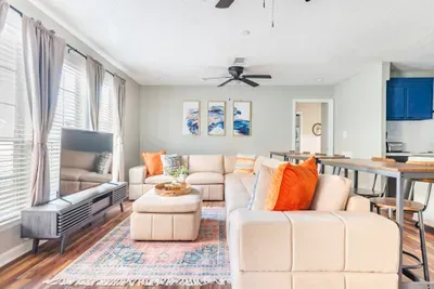 Large TV and plenty of comfy seating for the big game