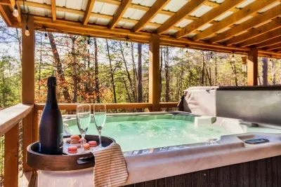 The serene back deck has a 6 seater hot tub and lounge area.