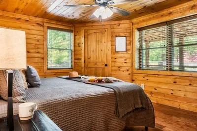 Guest bedroom with king bed and 55 inch smart TV