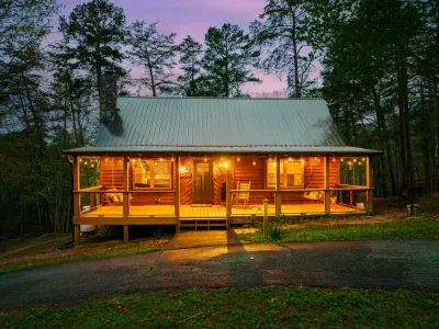 Beautiful cabin located on Bluff Mountain with flat parking for 3 vehicles.